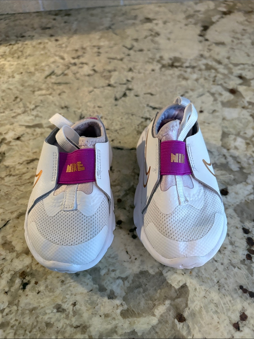 Nike Kids White Sneakers with Pink Strap and Gold Swoosh